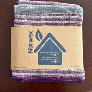 Norwex Body and Face Pack. Two striped and one solid gray.